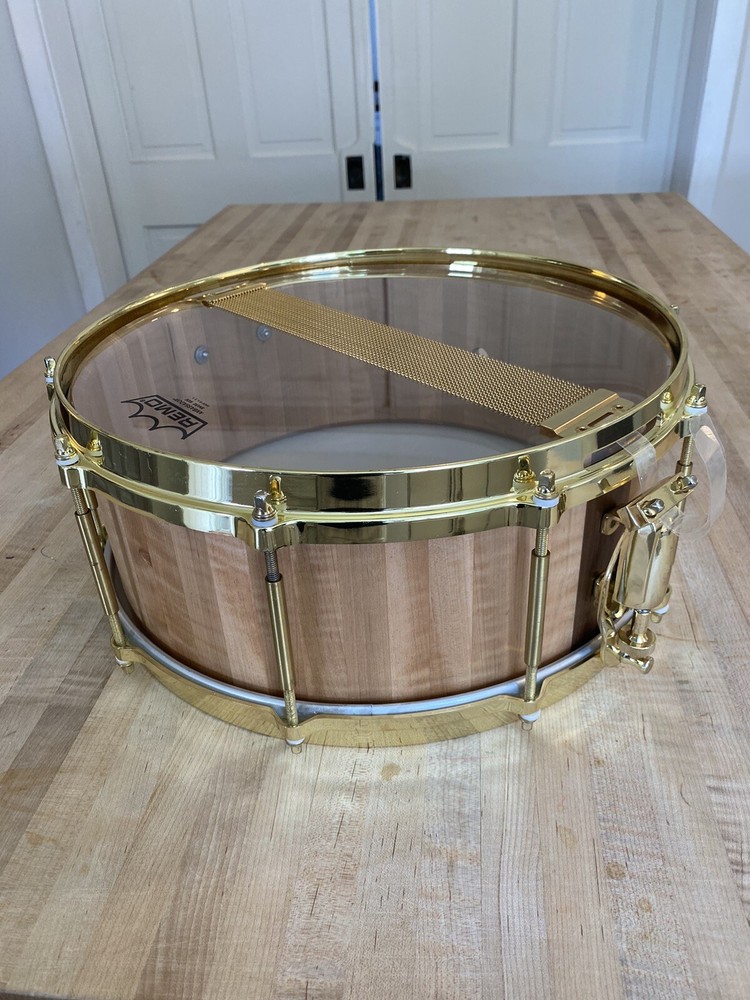 5 1/2 x 14 Custom made snare drum. Curly Maple Stave shell.