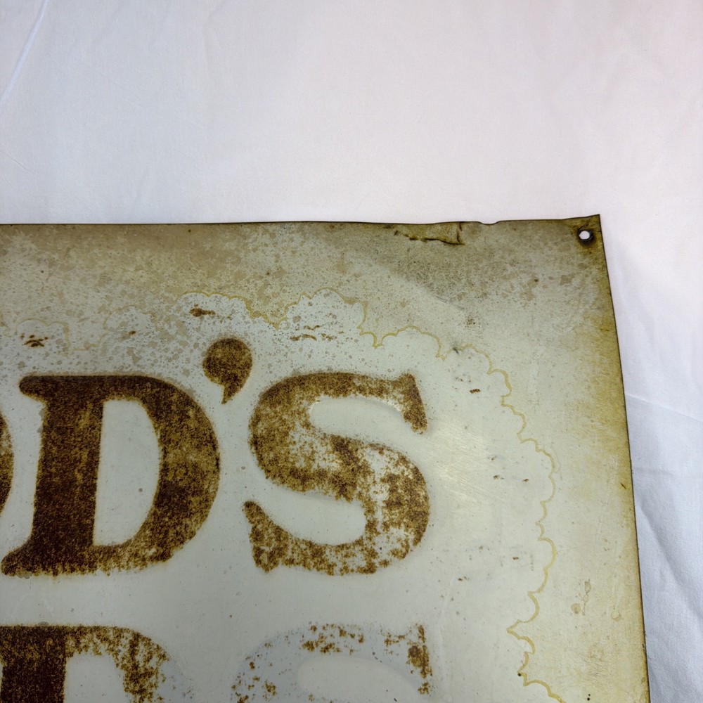 Woods Seeds Embossed Tin Sign