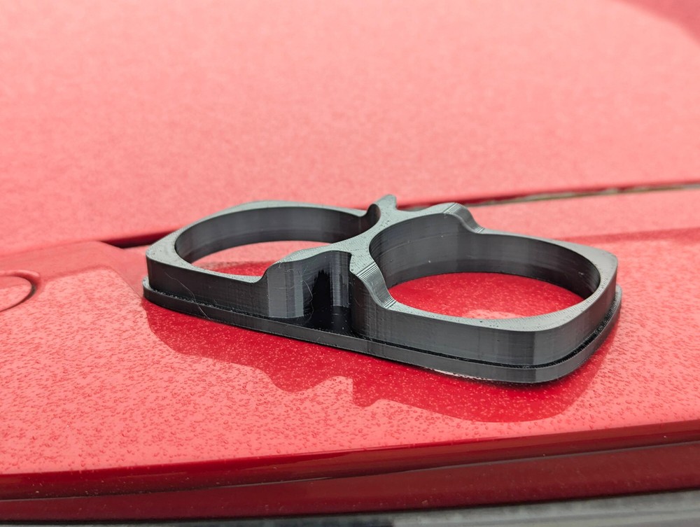 Cup holder insert for Suzuki Swift 2005-2010.