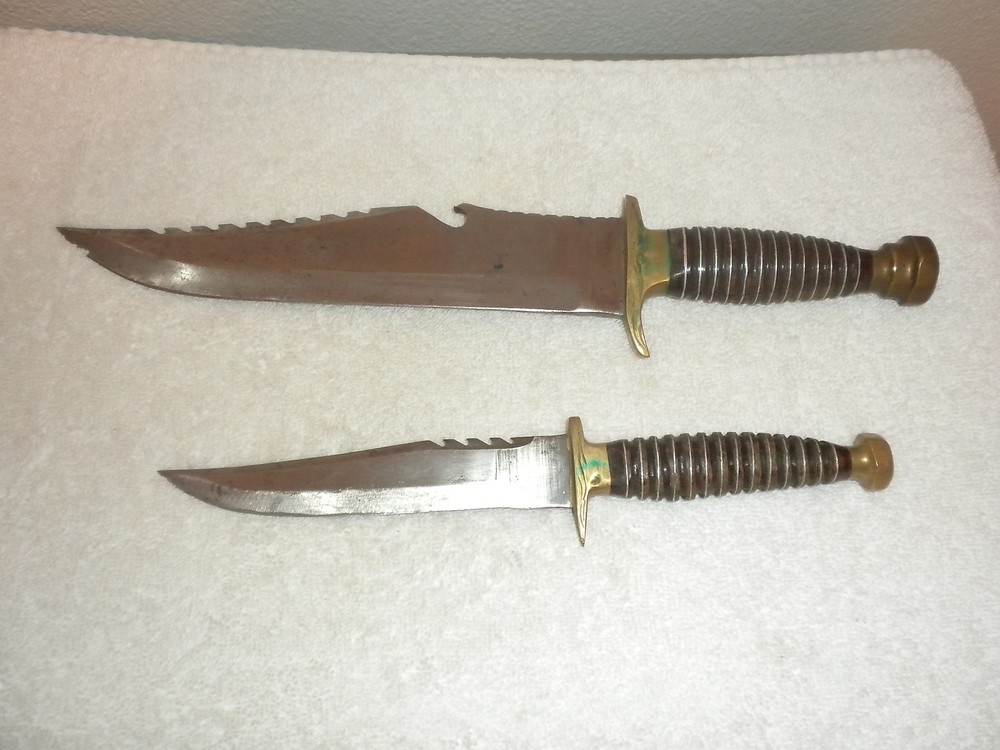 TWO KNIVES SAME DESIGN WITH LEATHER HOLDER