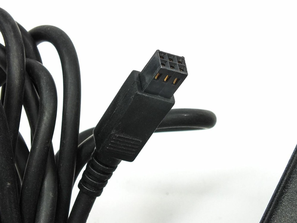 Microcom 13-0000004-001 19.5 or 20 VAC Modem Power Supply - 120 VAC Input