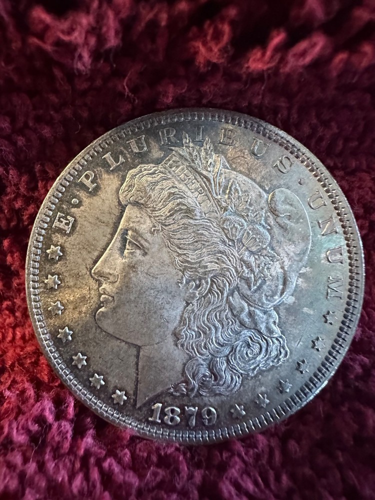 1879 morgan dollar Unc. ++++ with PL under toning