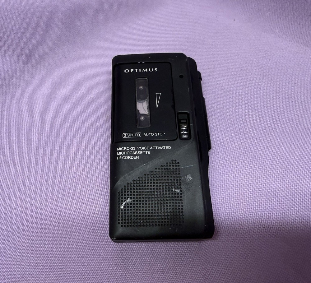 Optimus Micro-33 Voice Activated Microcassette Recorder. Not Tested.