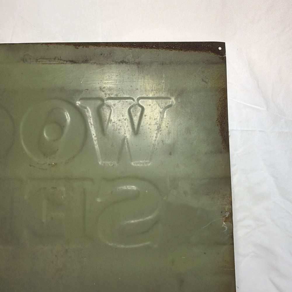 Woods Seeds Embossed Tin Sign