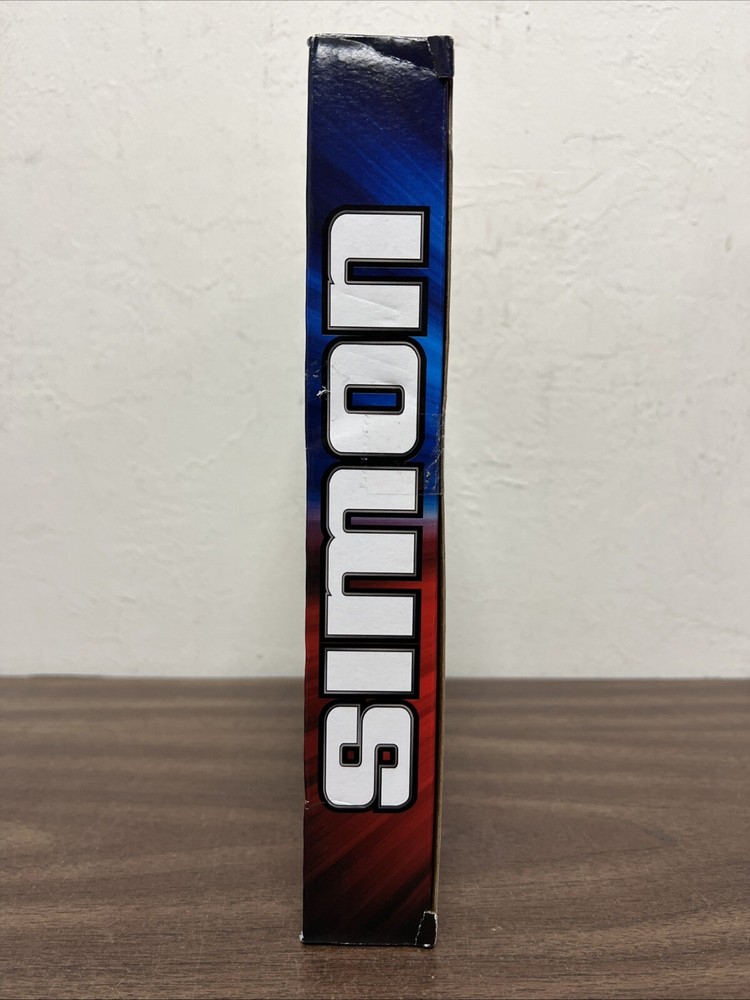 Hasbro Simon Handheld Electronic Game