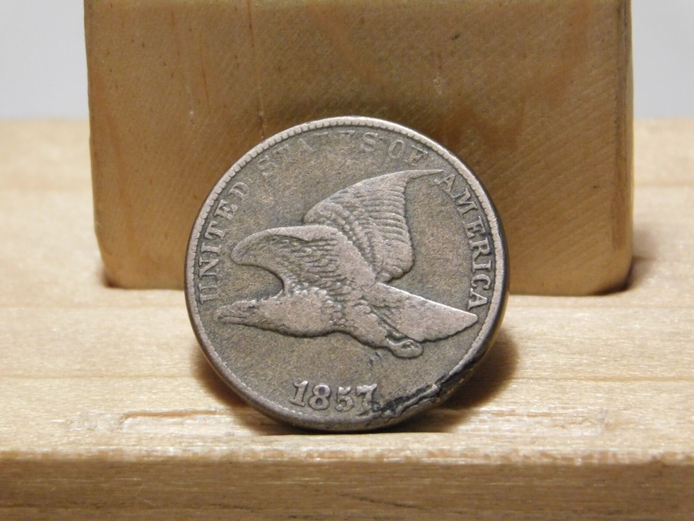 1857 U.S. Flying Eagle cent, lamination error at edge