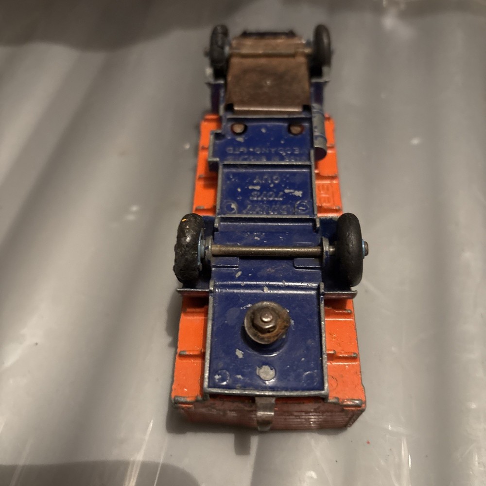 DINKY GUY FLATBED with tailboard 1950s. orange & blue