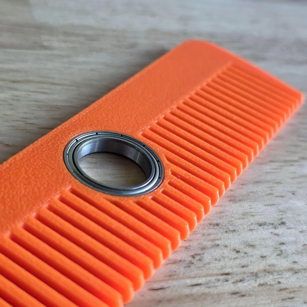 Spin & Style: The Ultimate Fidget Comb!