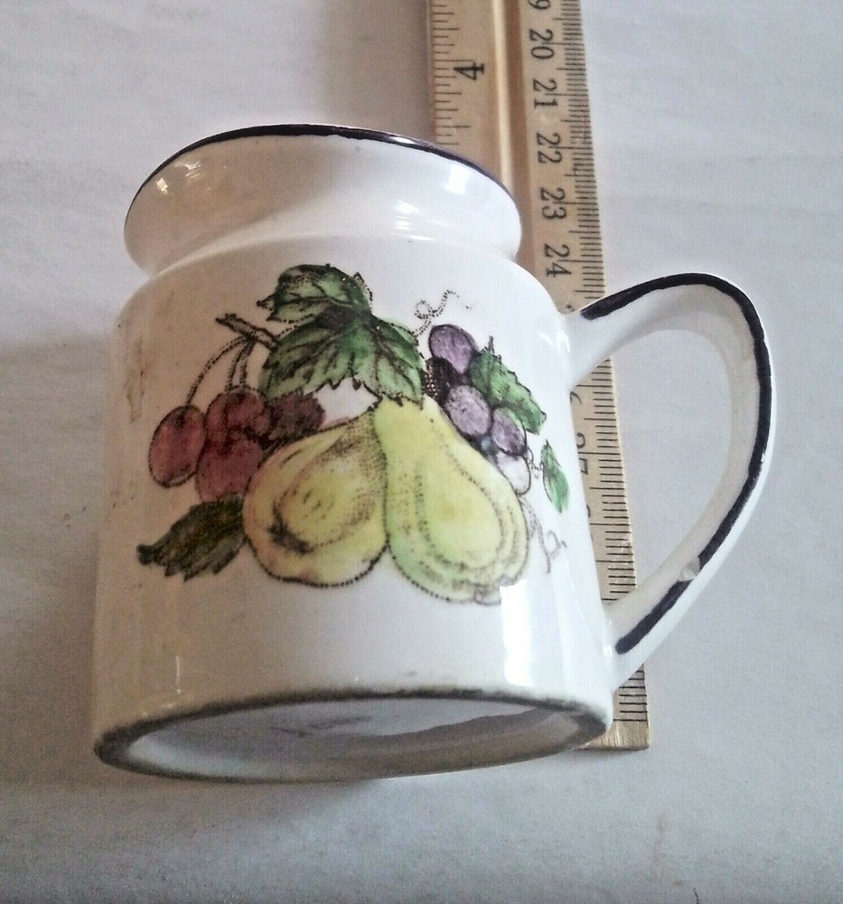 Porcelain Creamer 1/2 Cup marked on Bottom.