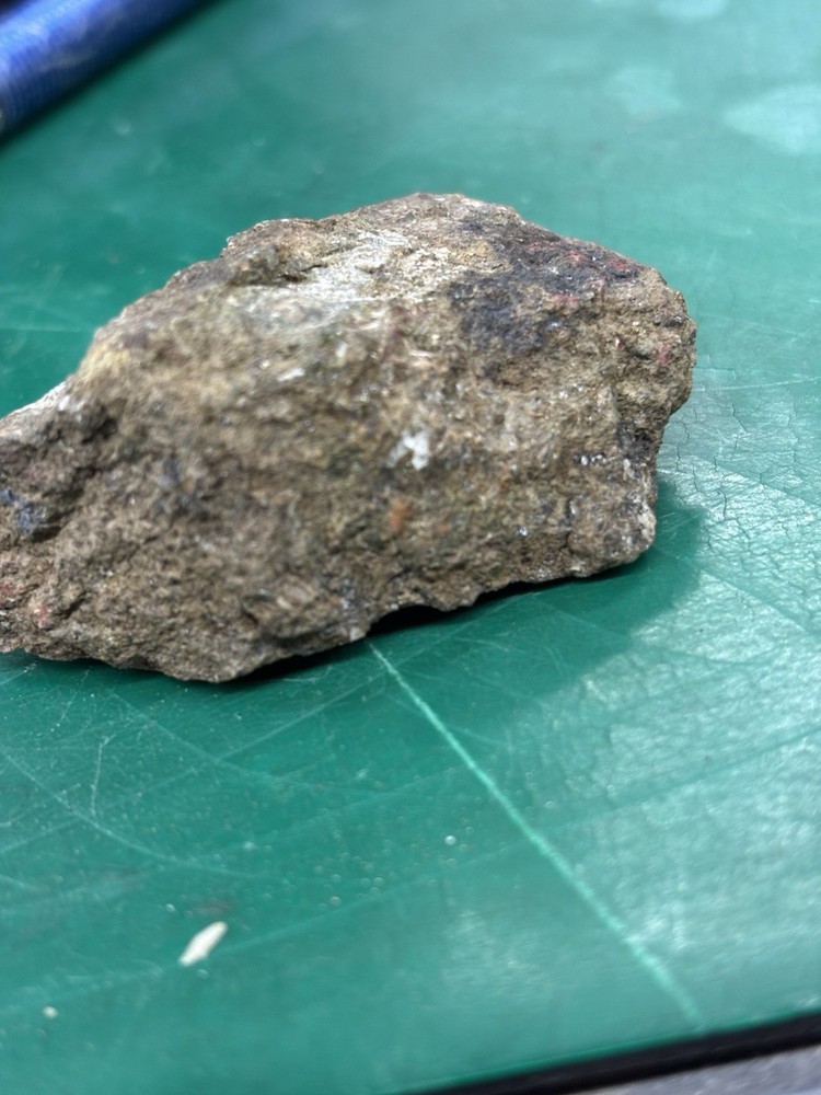 as gold ore on green stone