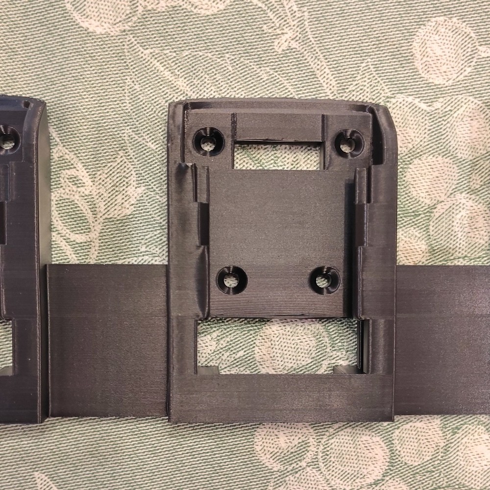 Black Dewalt battery holder, Wall Mountable