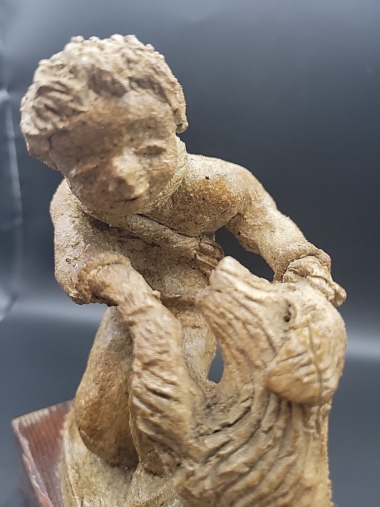 Boy And Dog Clay Sculpture