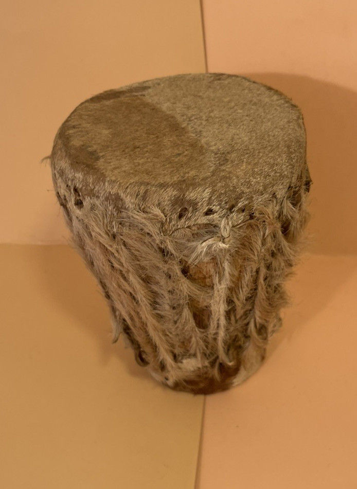 A small vintage hand drum