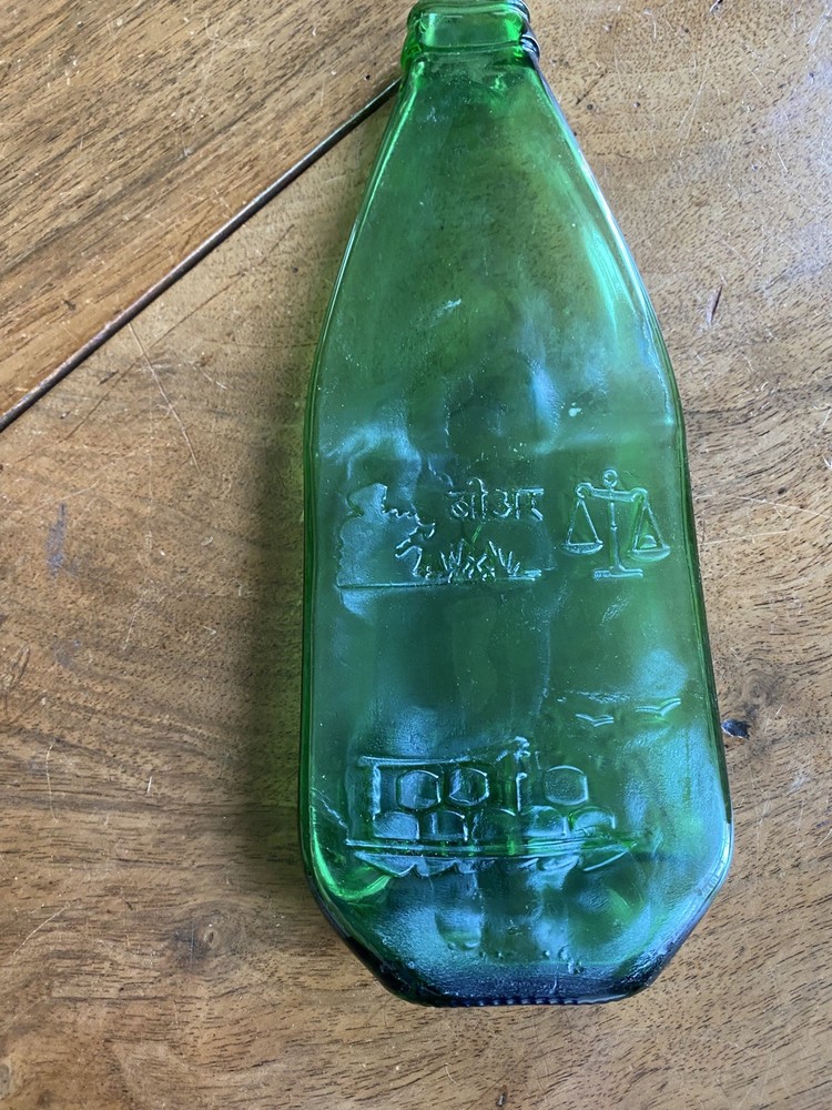 Squashed Green Glass Bottle 23 cms Long with Oriental Design