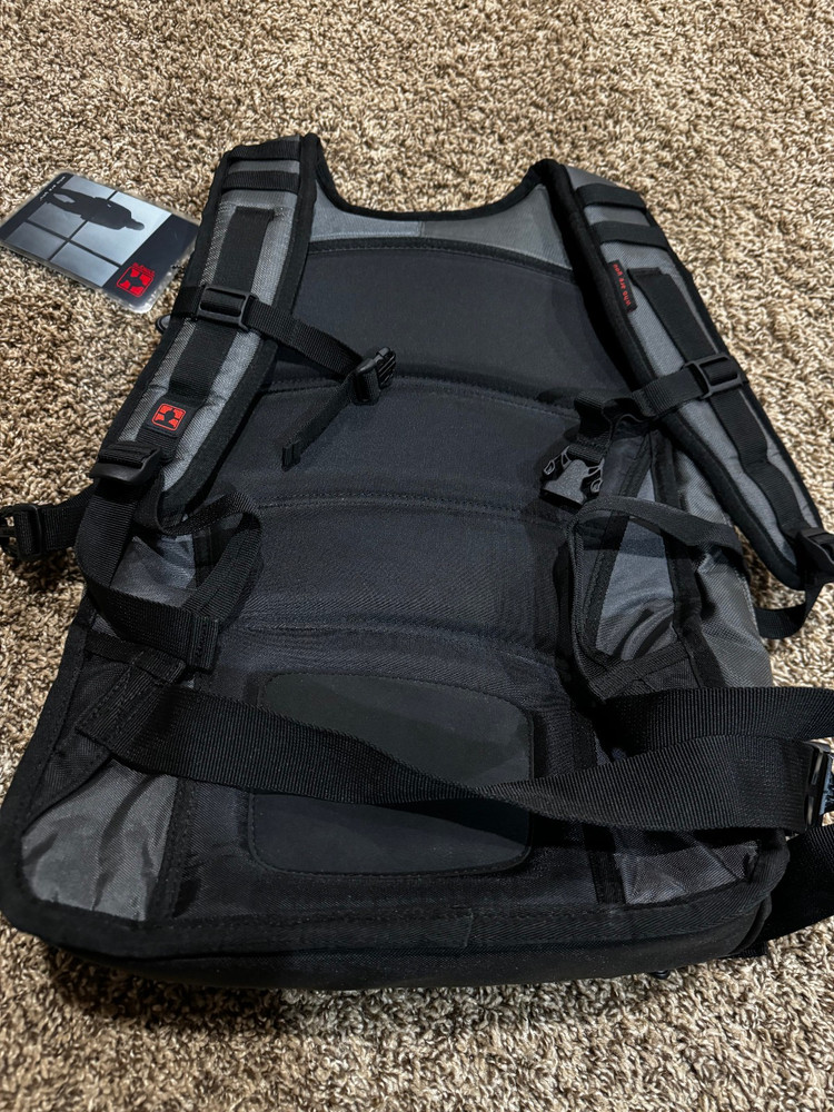 Subject, "The EAZMA" snowboarding backpack.