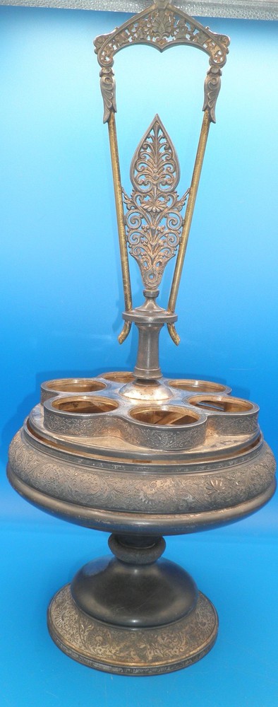 Middletown Silver company 6 bottle castor set silver plate frame holder