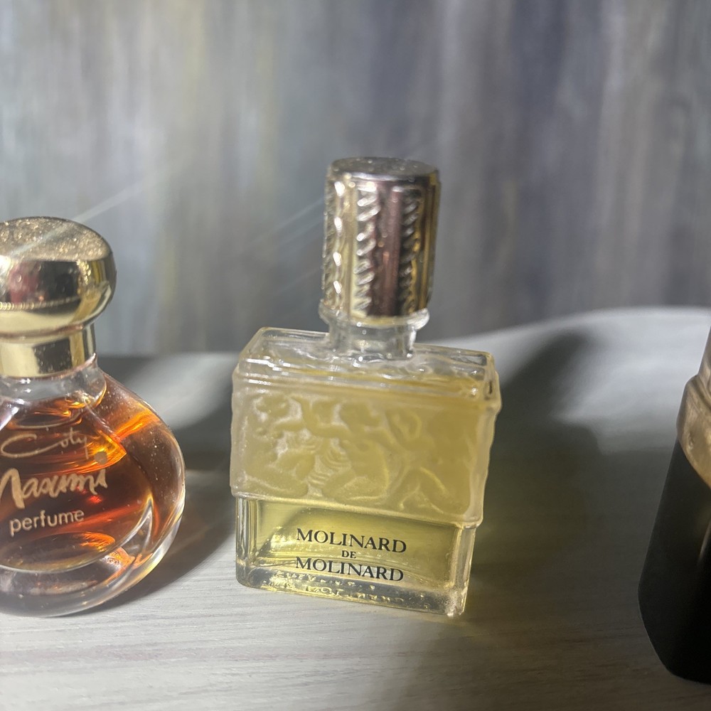 4 Vintage Mini perfume bottles. 3 Never Used, 1 Refil Case/ Bottle Empty.