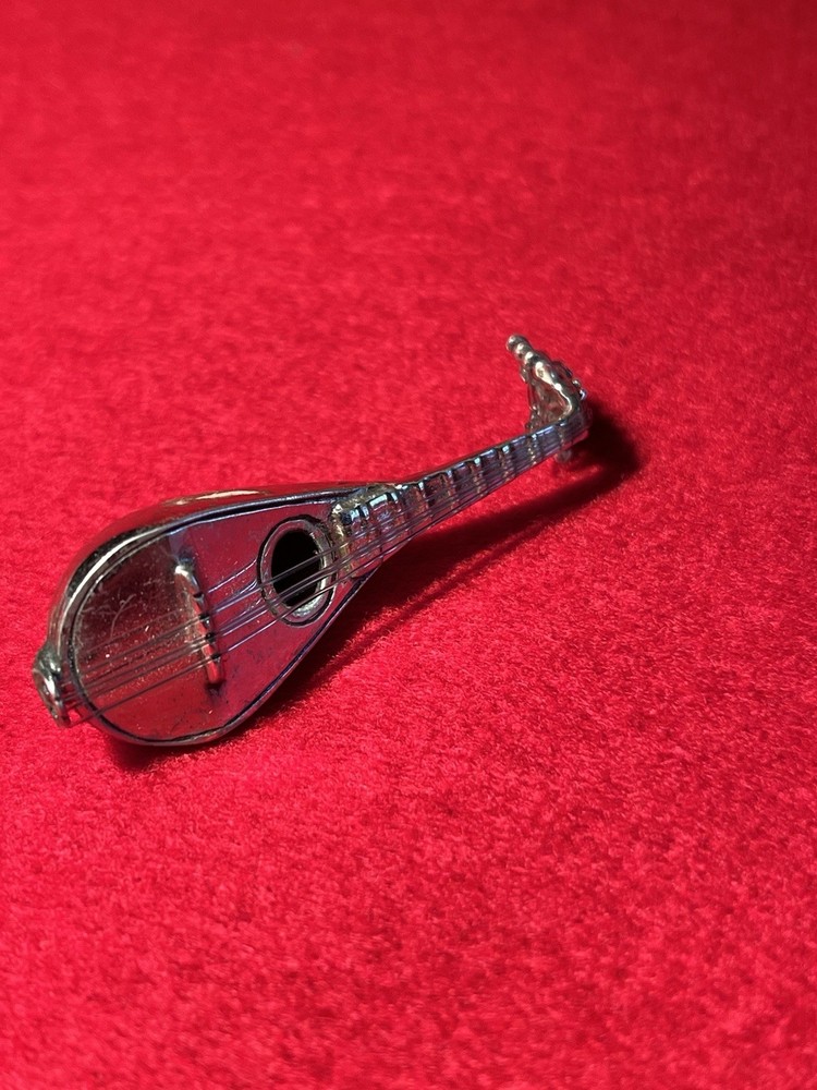 silver miniature 800 mandolin w/ seperate strings