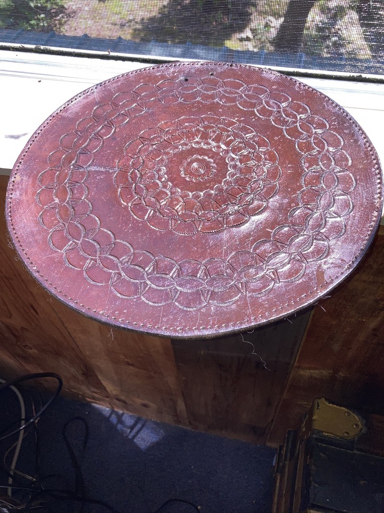 vintage embossed circular 12” leather piece