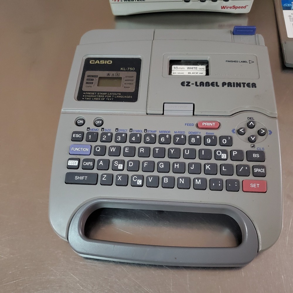 Lot of 5 Electronics Items: Casio, Microsoft, D-Link, Westell, Dirt Devil