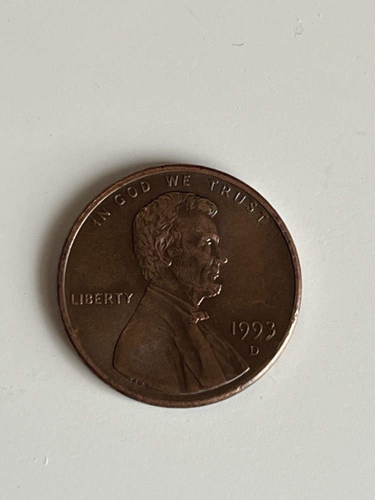 1993 d mark penny with die error between colums