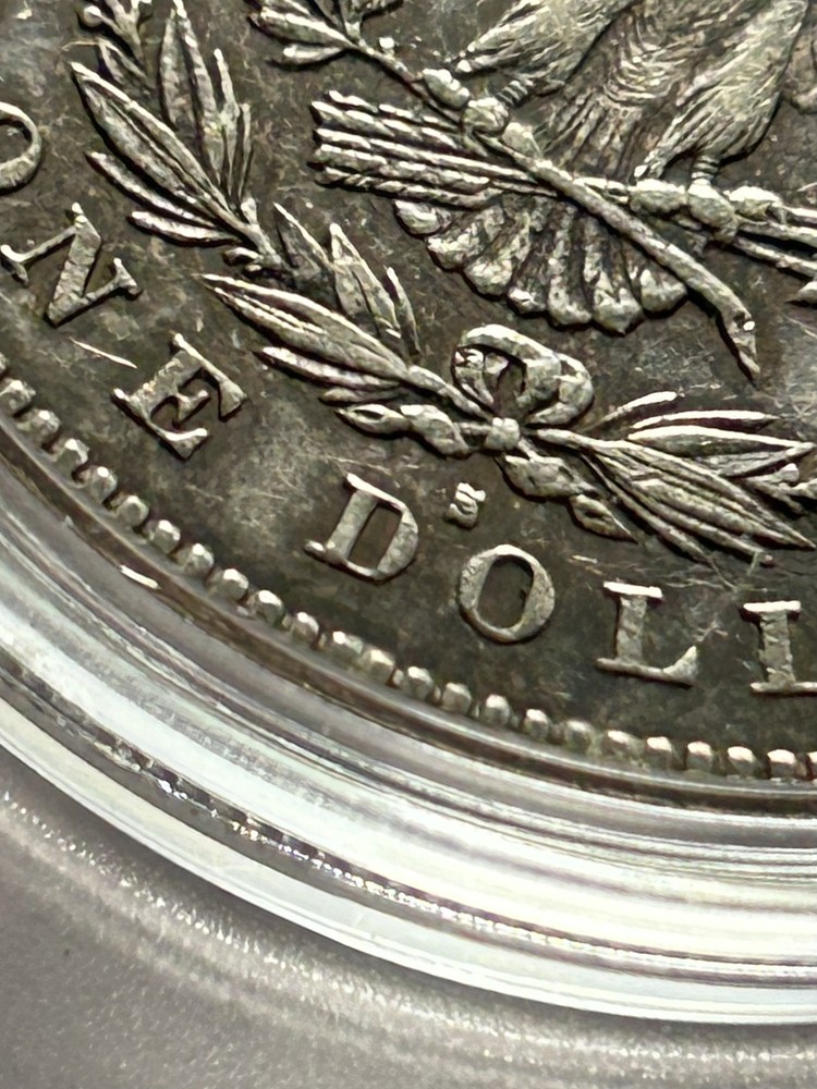 1878 s Morgan silver dollar in protective case