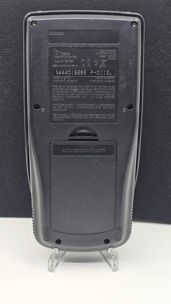 Texas Instruments TI-83 Plus Handheld Graphing Calculator With Slide Cover