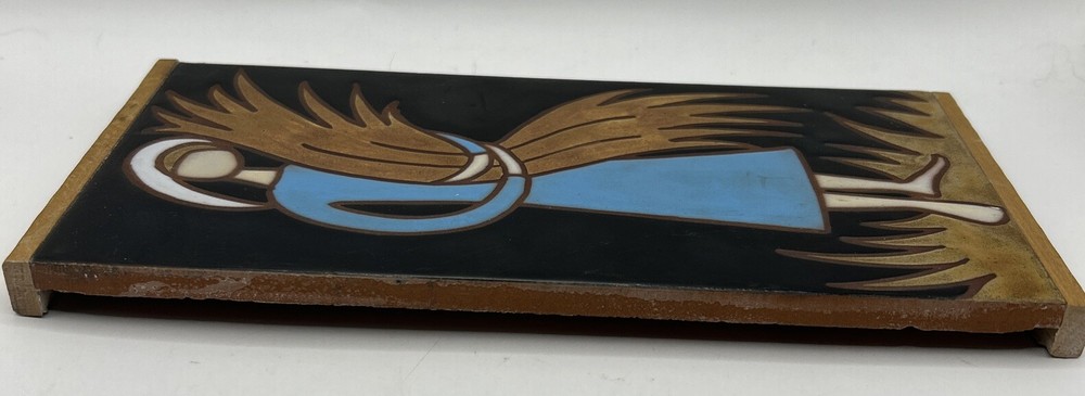 Girl holding wheat tile signed