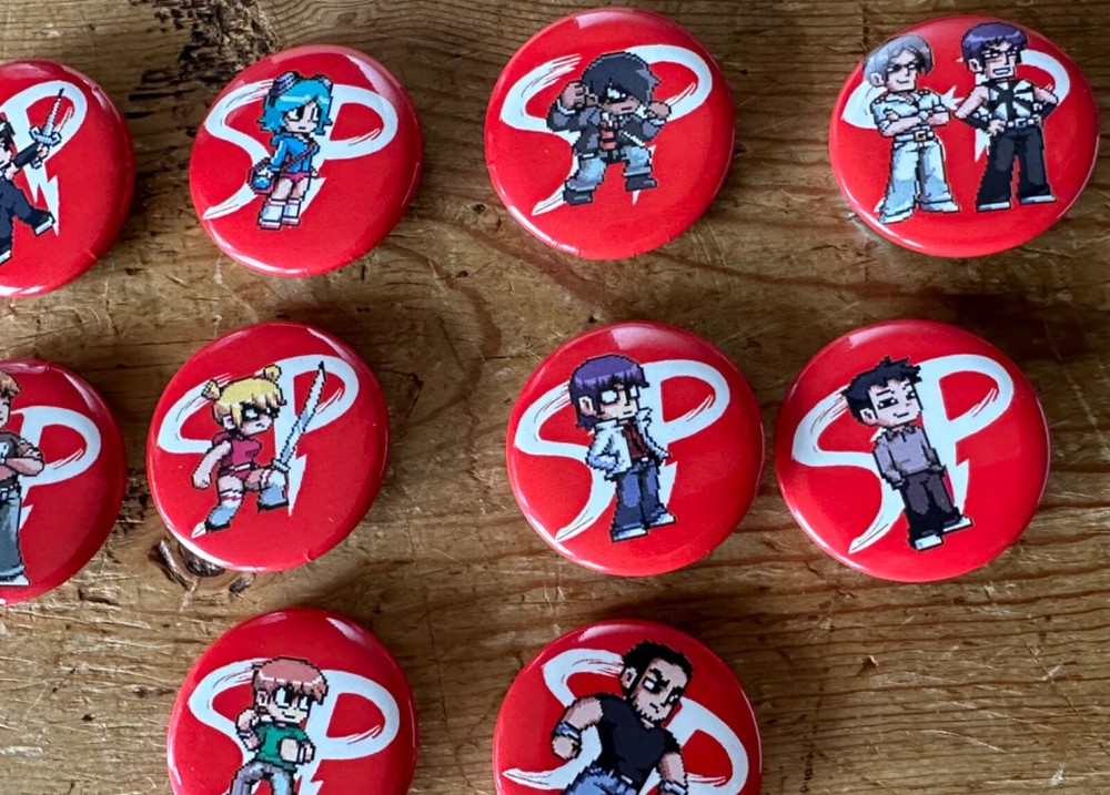 SCOTT PILGRIM VS THE WORLD THE GAME SDCC 2010 COMIC CON PINS BRYAN LEE BUTTON