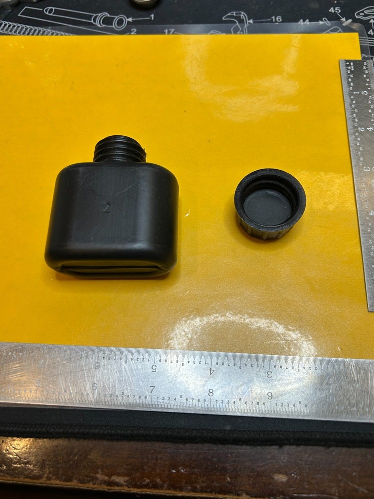 Military Surplus Black Plastic Oil Bottle
