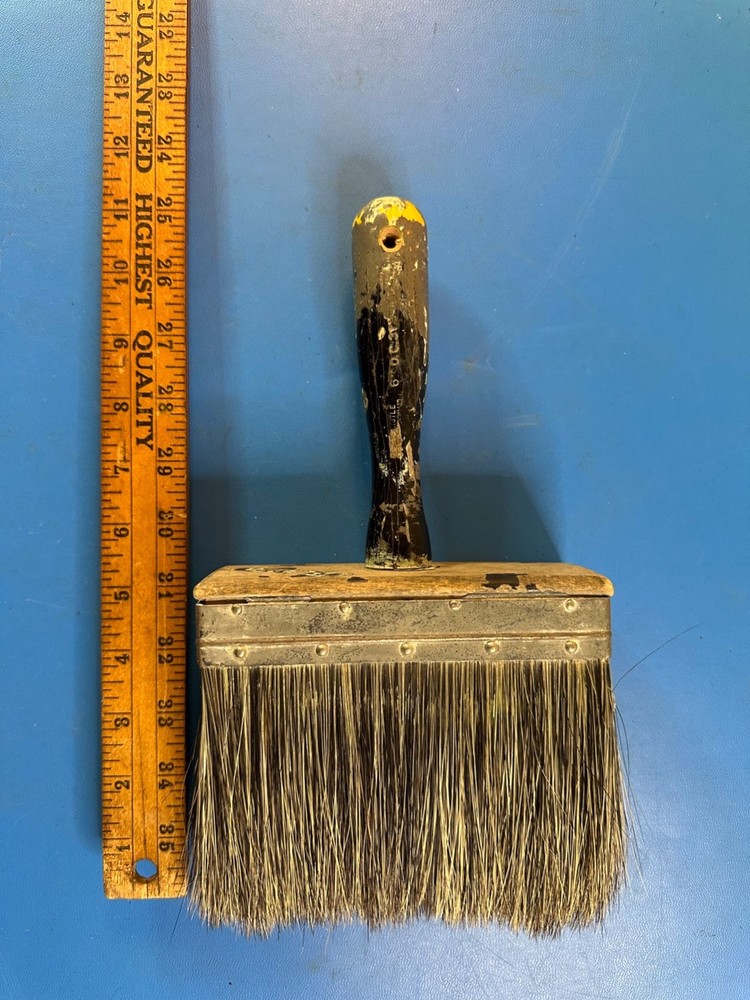 Large vintage plastering paint brush