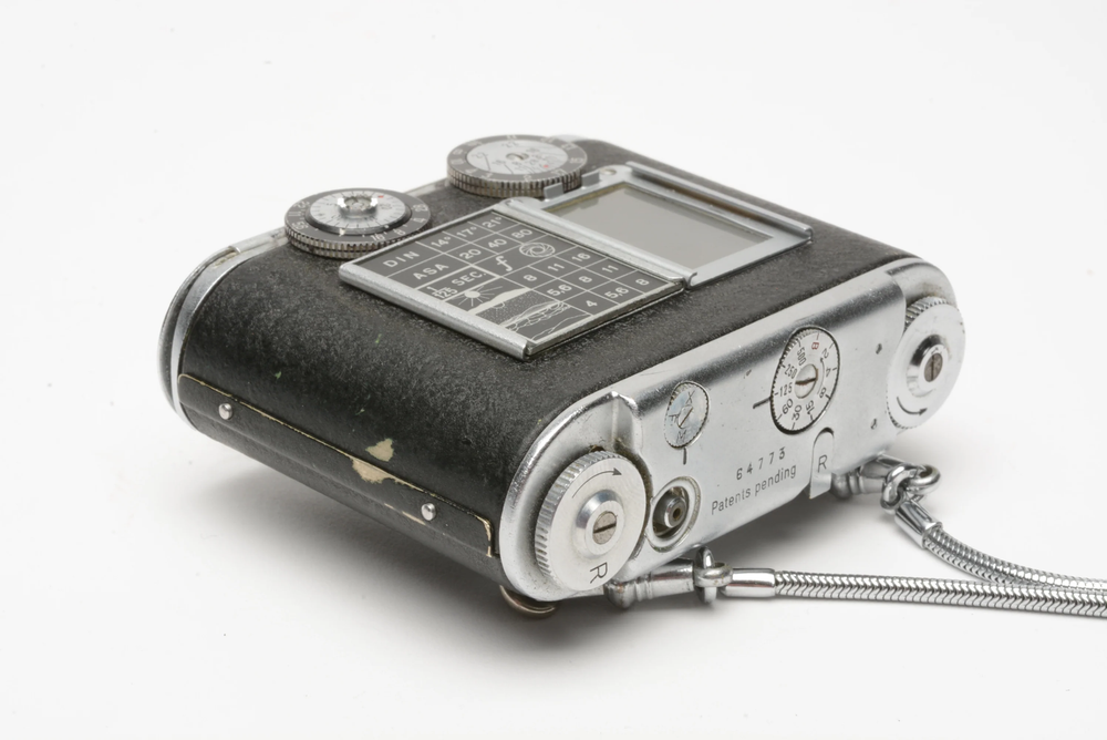Tessina subminiature compact camera, tested, works great, w/strap