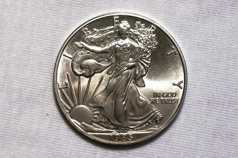 Daniel Carr - "1985" Silver Eagle Dollar - Overstrike - Proof-Like Finish