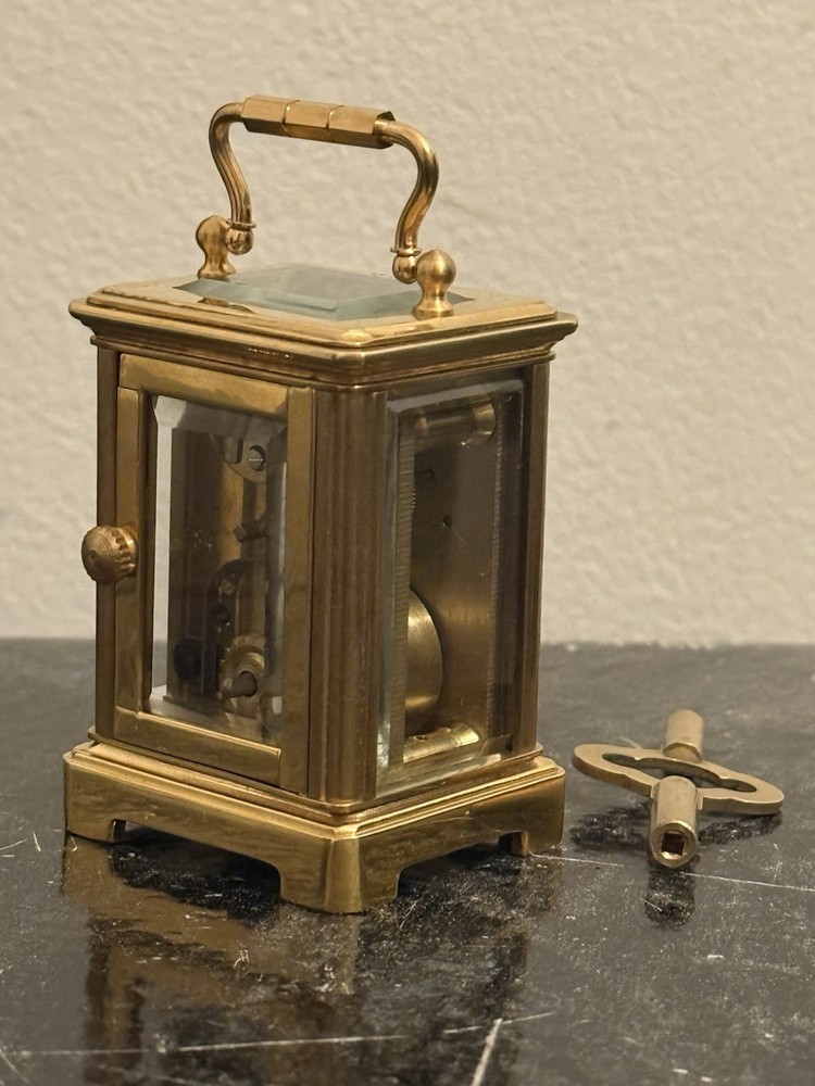 Bronze miniature carriage clock with a silver plated front
