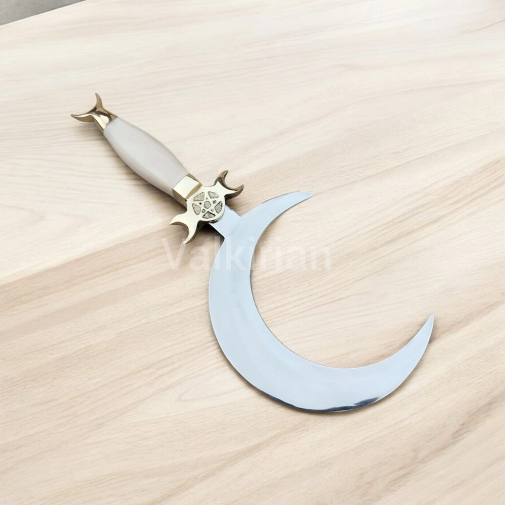 Handcrafted Crescent Moon Dagger with a curved blade and camel bone horn handle.