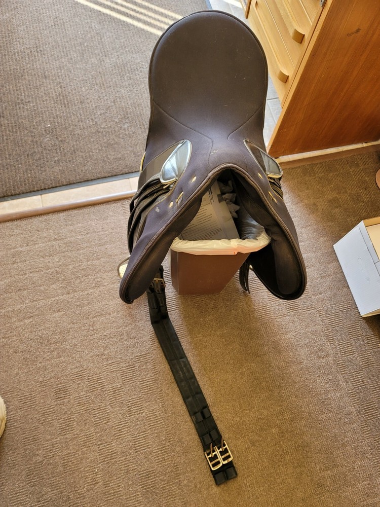 Wintec all purpose saddle with irons and girth strap