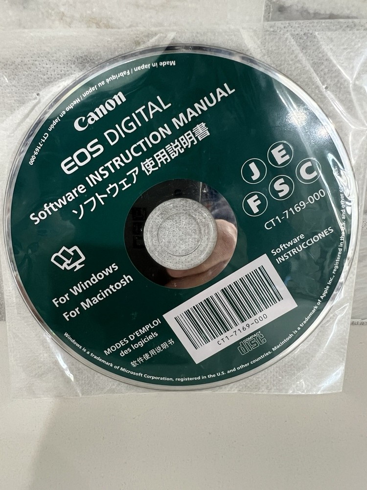 Canon 58mm Filter Kit LP-E5 battery plus Misc Accessories