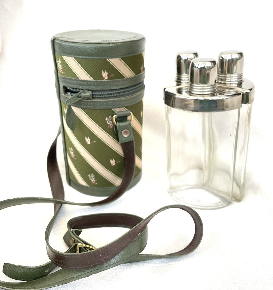 SPLENDID HUNTING STIRRUP CUP CASE WITH THREE SILVER PLATE MOUNTED FLASKS.