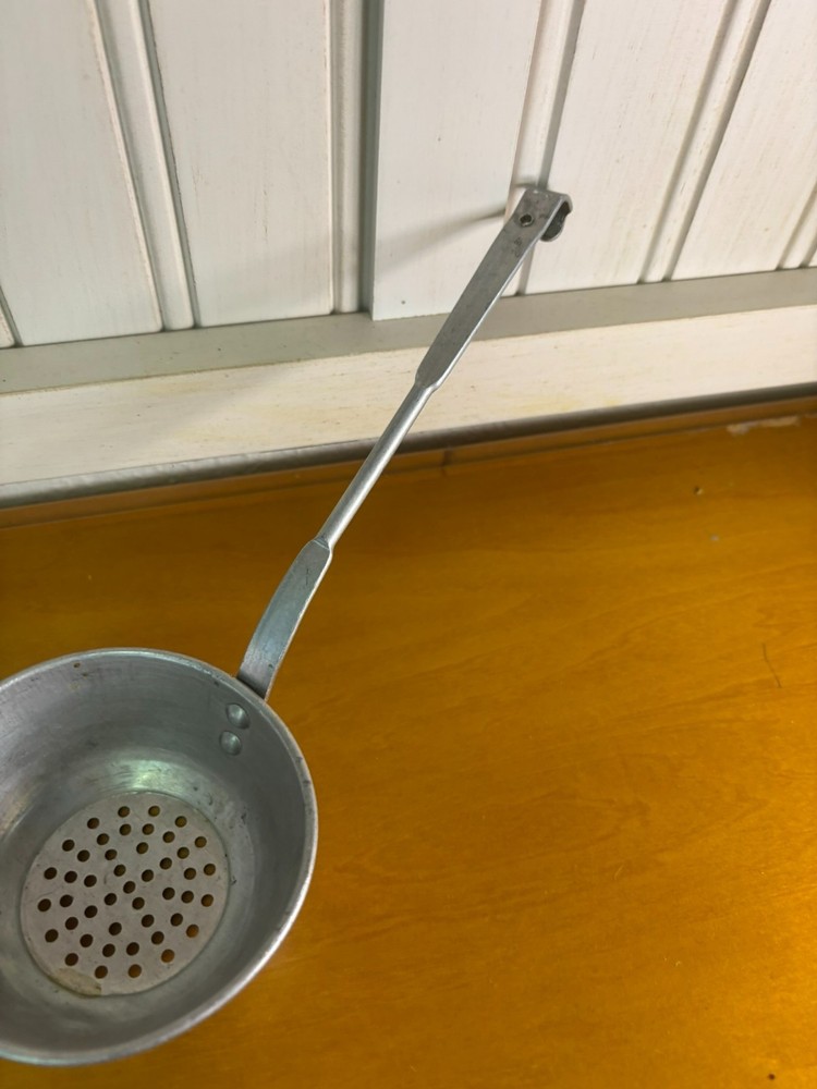 small vintage aluminum strainer