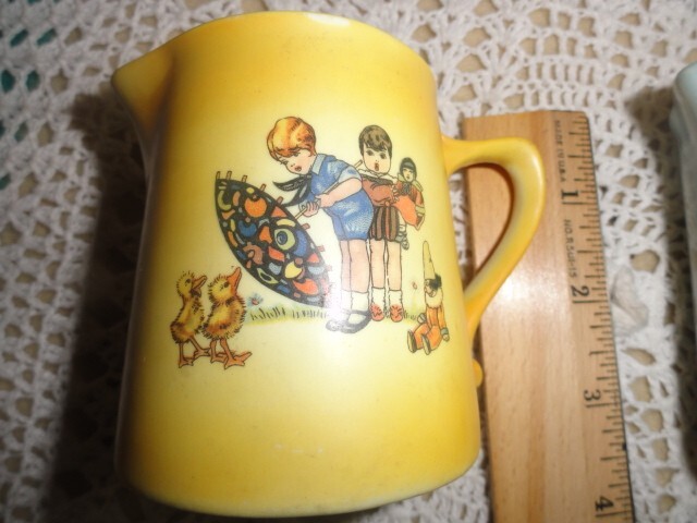 AVC O CHINA CREAM PITCHERS 2 PCS. 3" HIGH