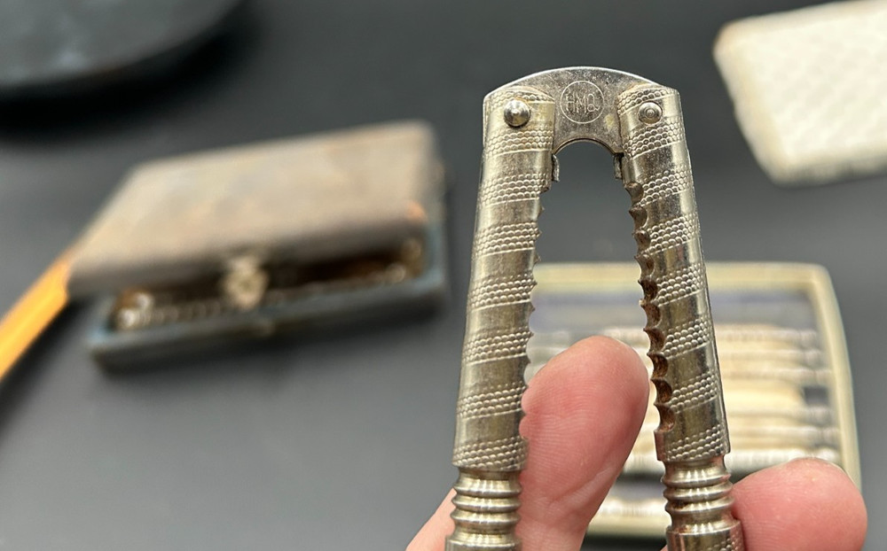 2 Vintage HMQ Metal Nut Cracker Sets. One Case