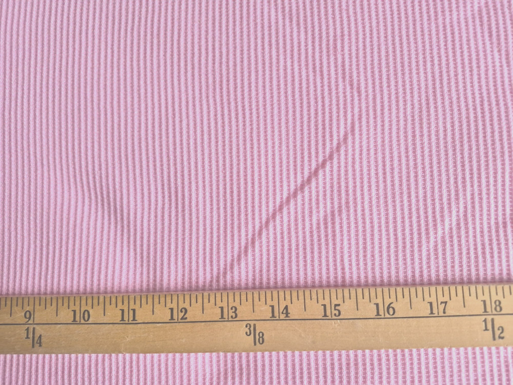 LT PINK  WAFFLE KNIT  NO STRETCH POLYESTER  BLEND FABRIC  BY THE YARD