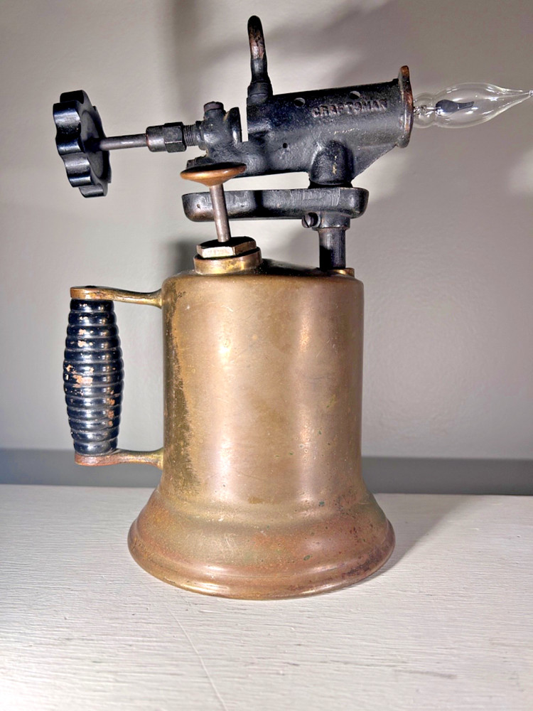 vintage brass torch lamp