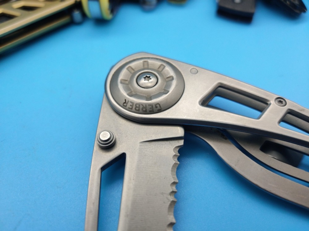 USED GERBER FOLDING PARAFRAME KNIFE PARTIALLY SERRATED BLADE b