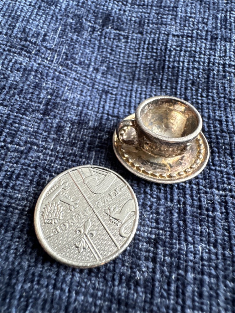 sterling silver miniature cup and saucer
