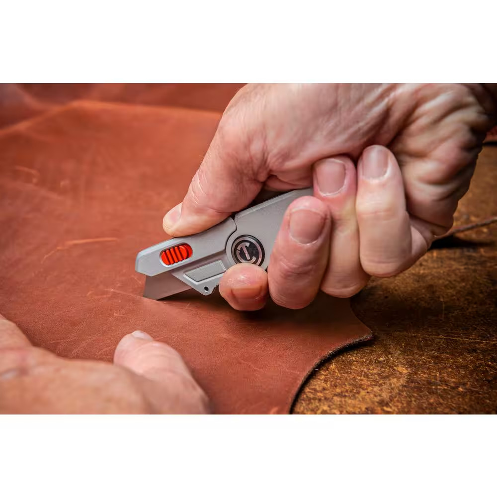 Compact Folding Utility Knife with Quick Change Blade