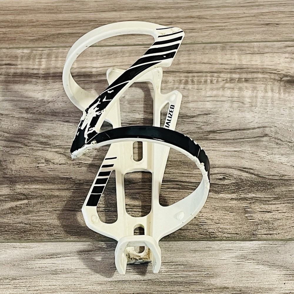 Used Specialized ZEE Bottle Cage Side Loading Right Entry White with Black
