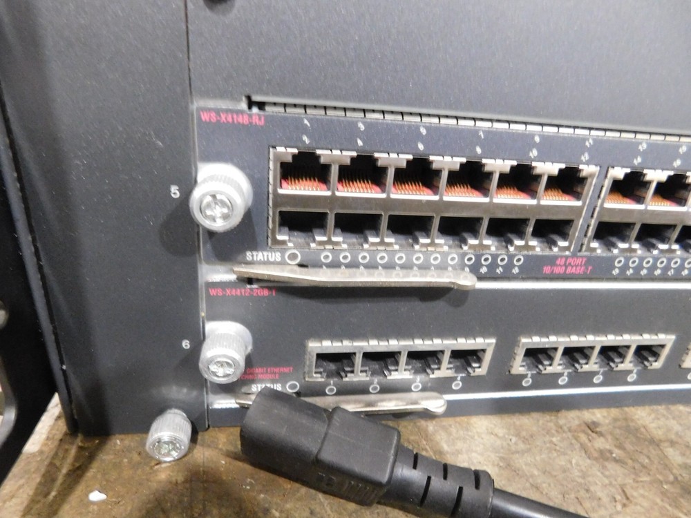 Cisco Catalyst WS-C4006 Switch. See full description for installed Modules: