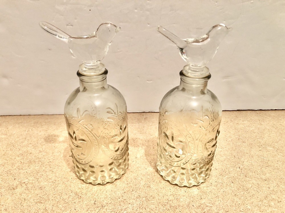 perfume bottles with bird stoppers x2
