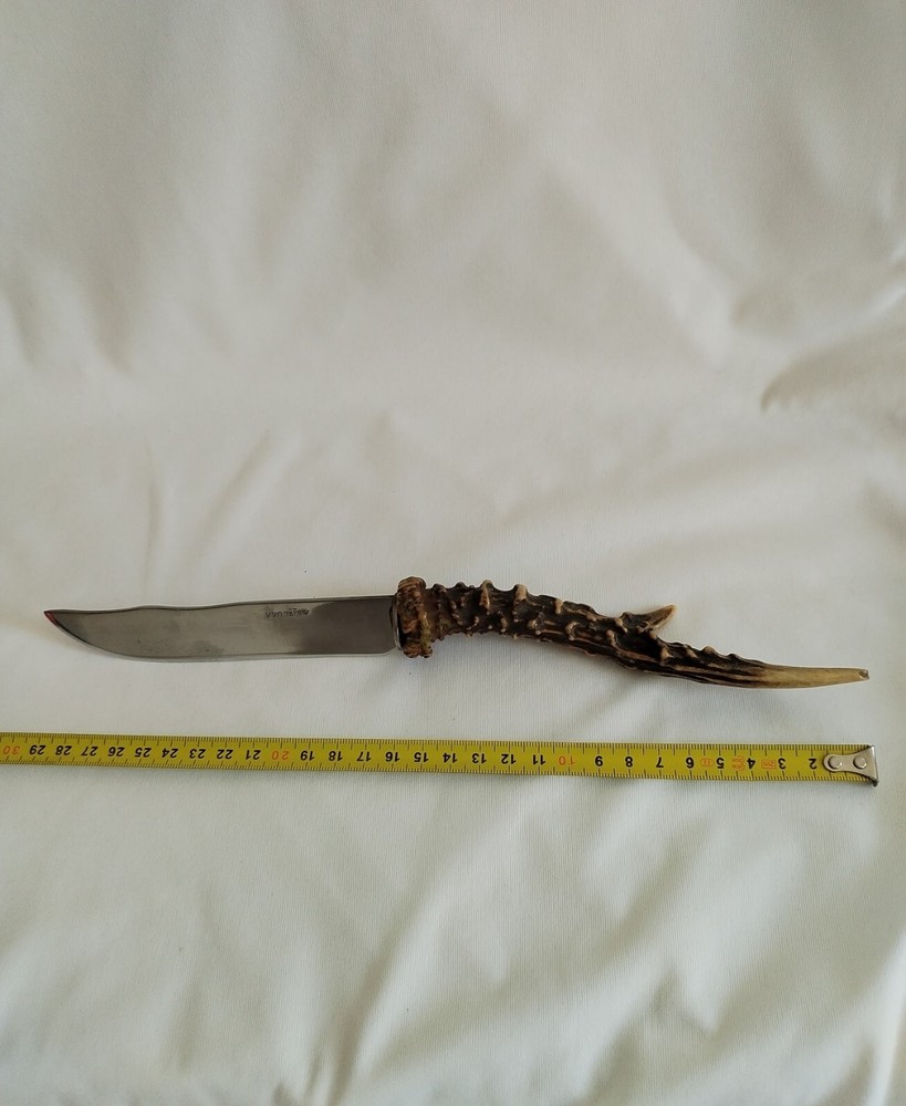 Vintage knife with deer horn handle